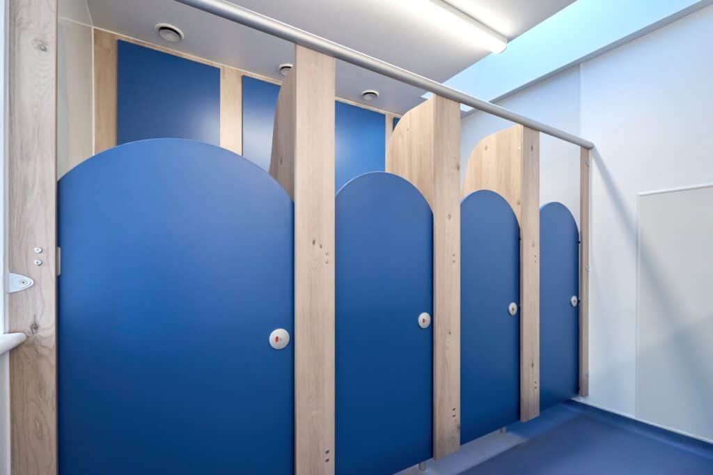 Arched washroom doors at Leckhampton Primary School by Concept Washroom