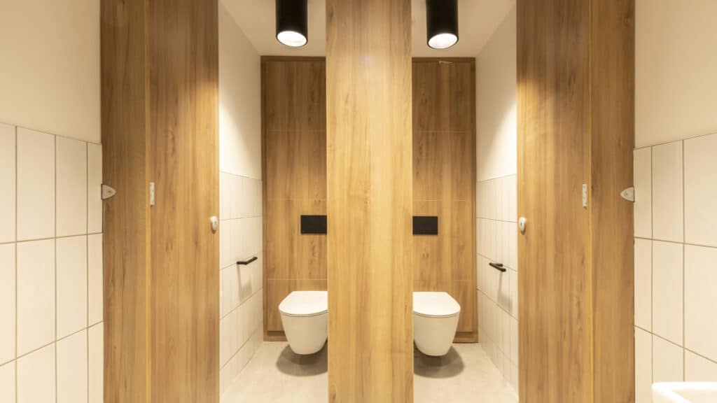 Full height high pressure laminate duct panels inside 2 cubicles